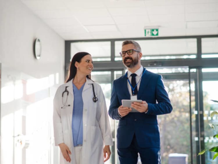 Medical professionals talking business.