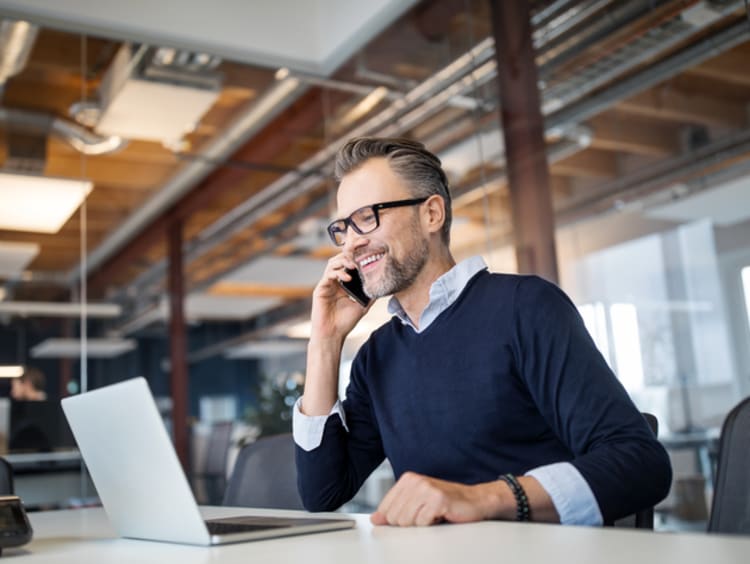 Businessman talking on the phone in an office