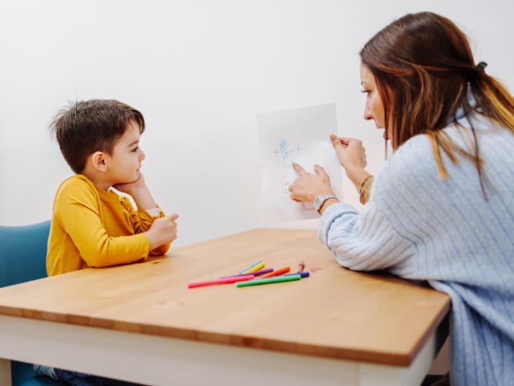 Psychologist works on an exercise with a patient.