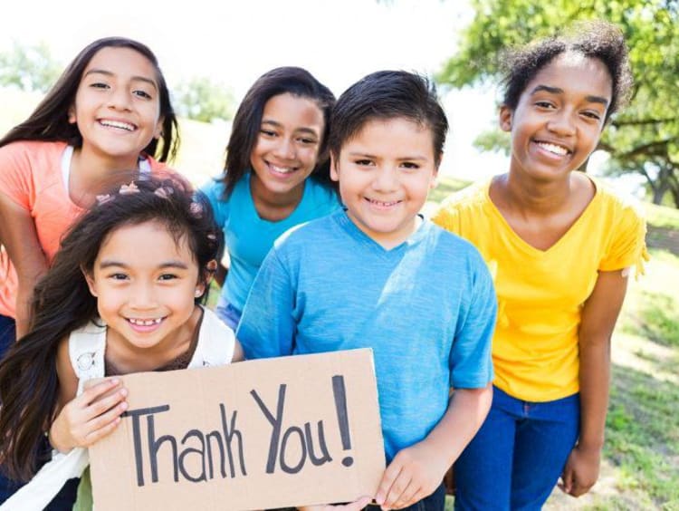 students saying thank you to a teacher