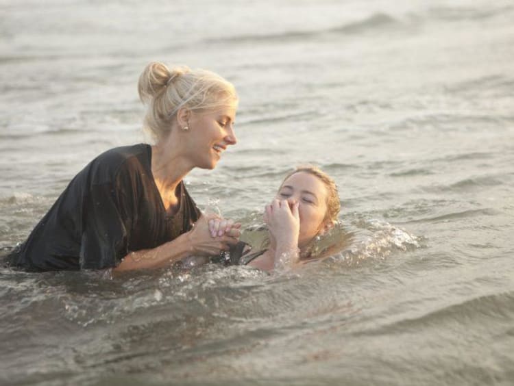 person getting baptised