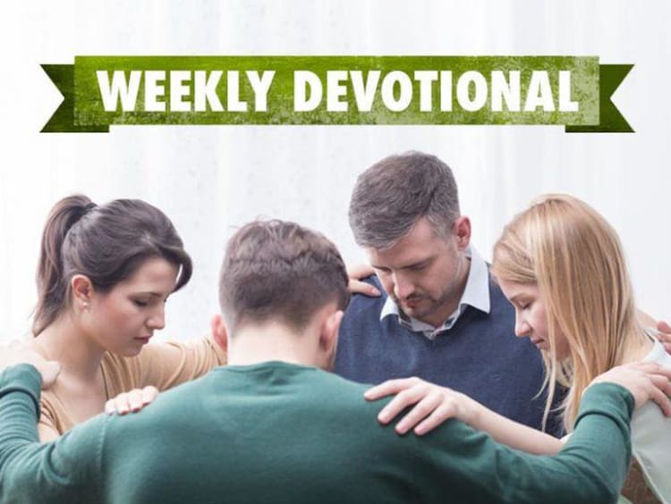 group of people praying