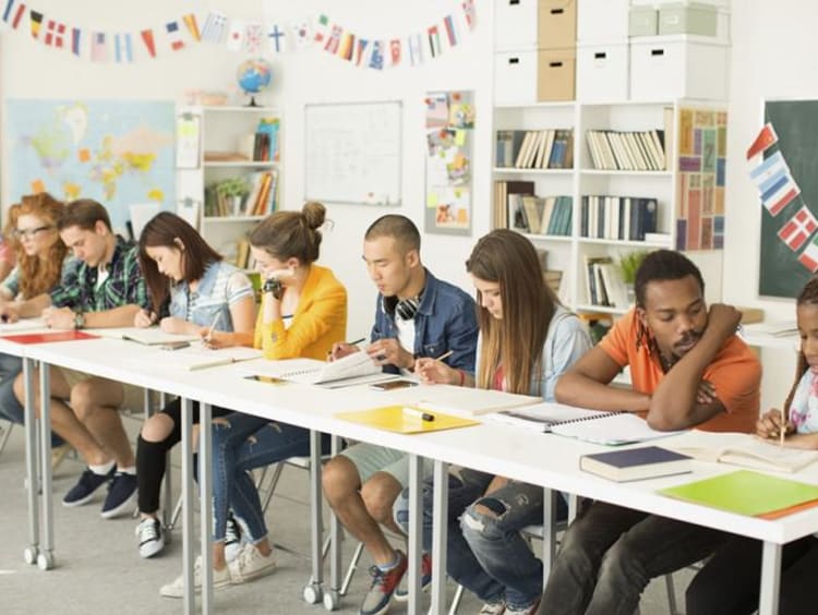 diverse group of students sitting together