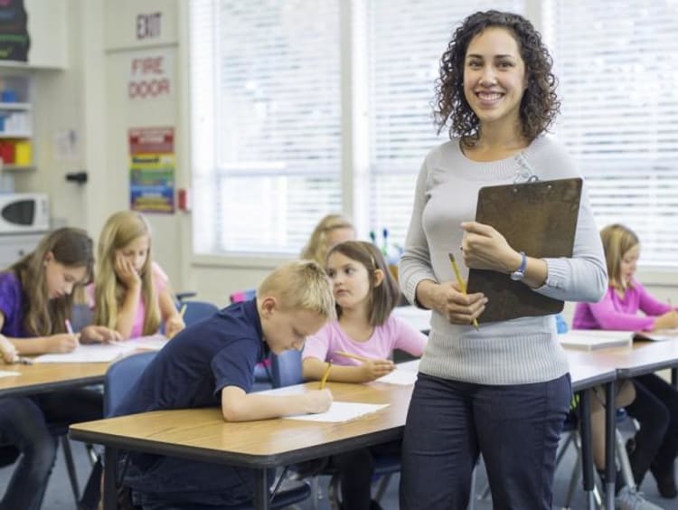 elementary teacher smiling