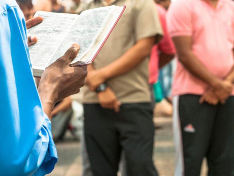 A person preaching in the street