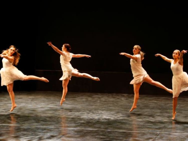 Dancers performing on stage