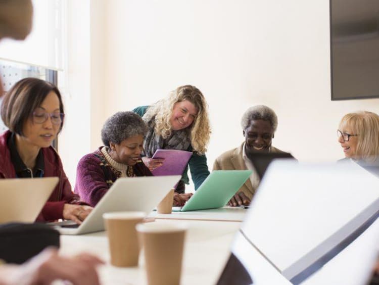 Employees collaborating during a meeting