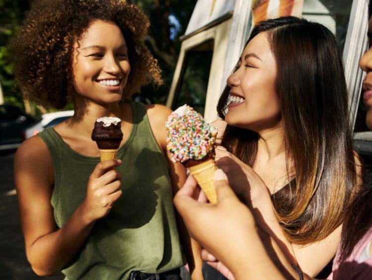 three girls eating ice cream