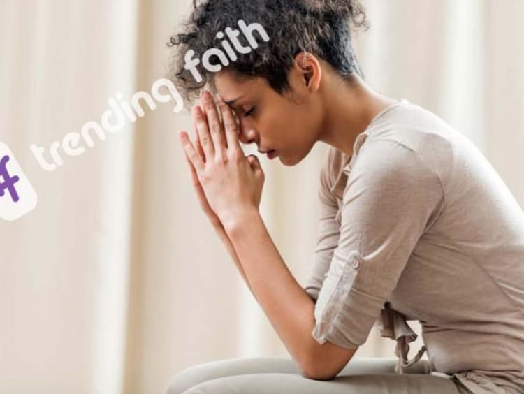 A person praying with the Trending Faith logo