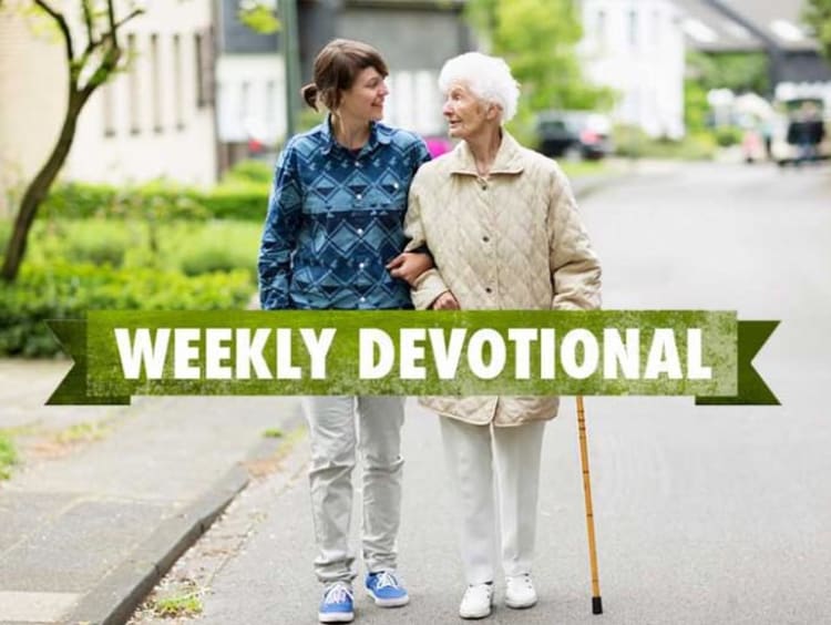Young man helps elderly female go for a walk with weekly devotional text layered on top of image