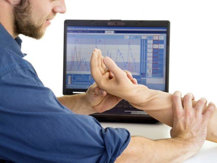 Man holding prosthetic arm