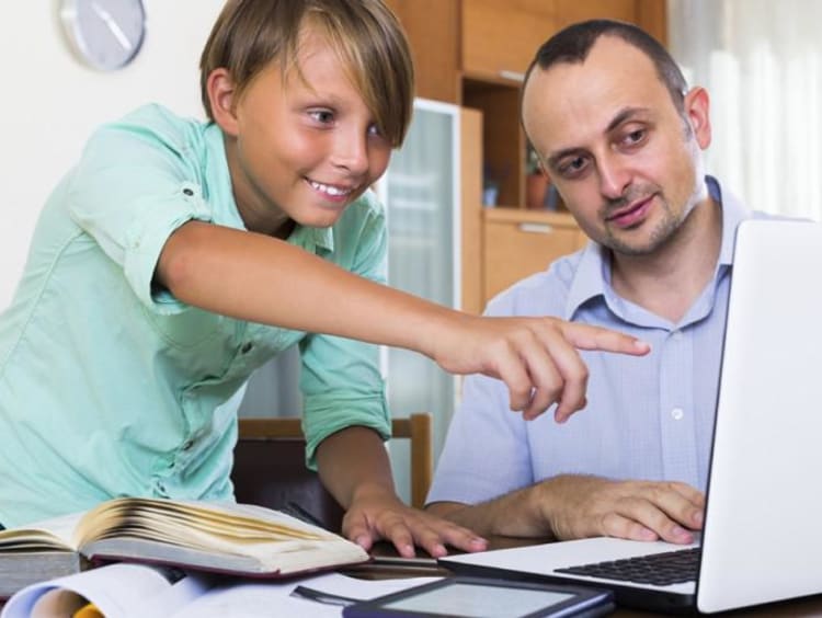 teacher helping gifted student