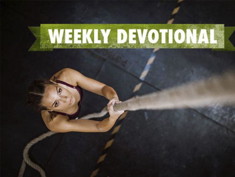Weekly Devotional: Woman climbing up a rope