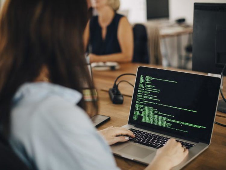 Woman working on code