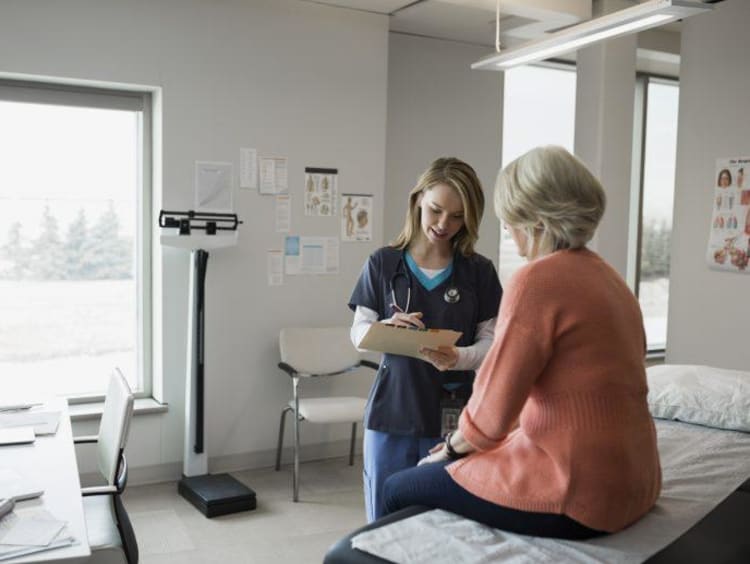 Nurse interacting with a patient