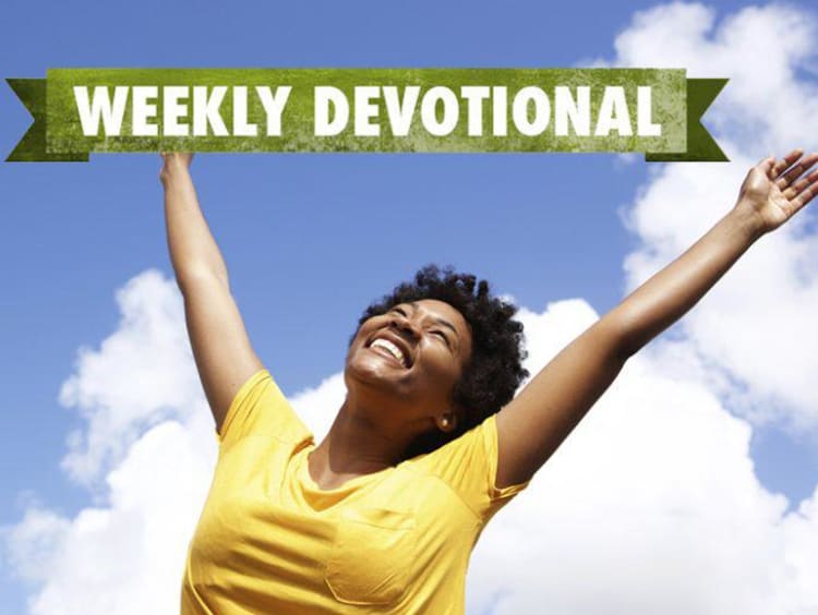Weekly Devotional: Woman smiling with her arms up