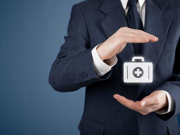 hands with doctor briefcase inbetween