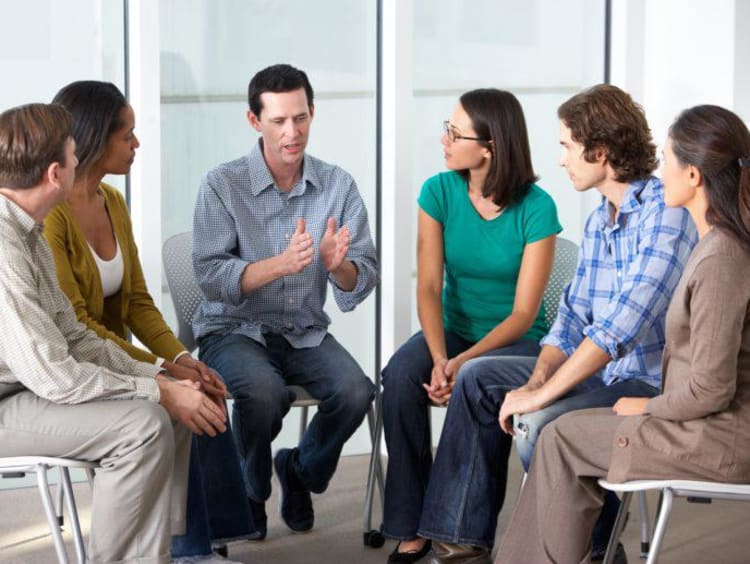 Addiction counseling students get together for team discussion