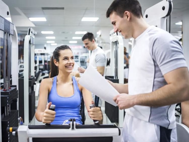 sports medicine worker with a client