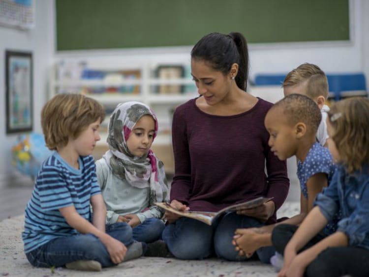 Reading circle time with teacher