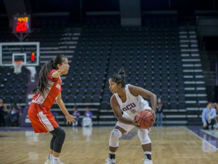 GCU student playing basketball
