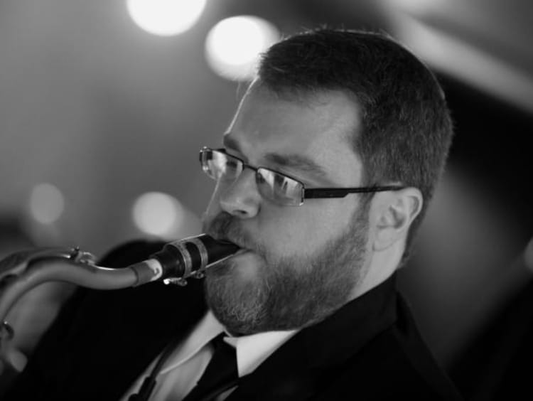 Andrew Gross playing sax