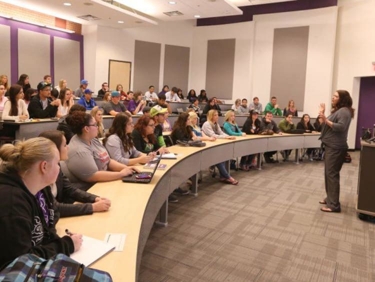 GCU students in a lecture hall on campus