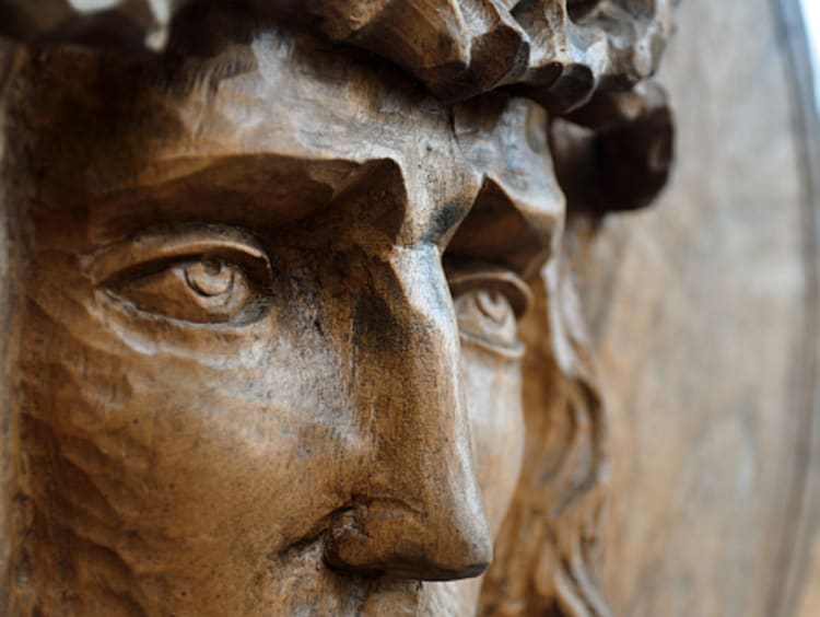 Closeup of a wooden Grecian or Roman statue