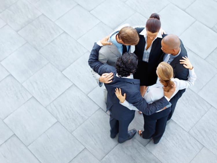 business people praying from God's perspective