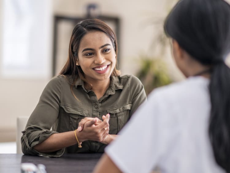 Woman having a discussion with her counselor