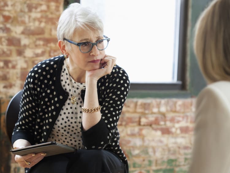 career counselor meeting with client in office
