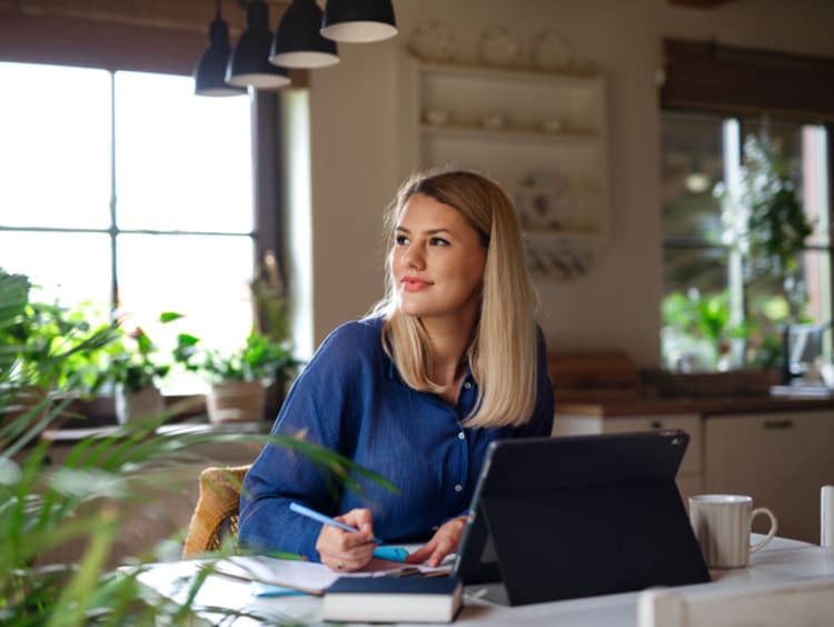 Young woman studying online at home