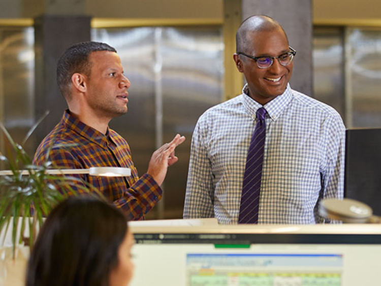 Two men working in an accounting office