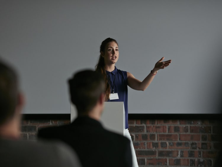 a teacher presenting during a parent teacher conference