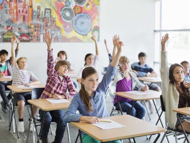 young students learning about restorative justice in a classroom