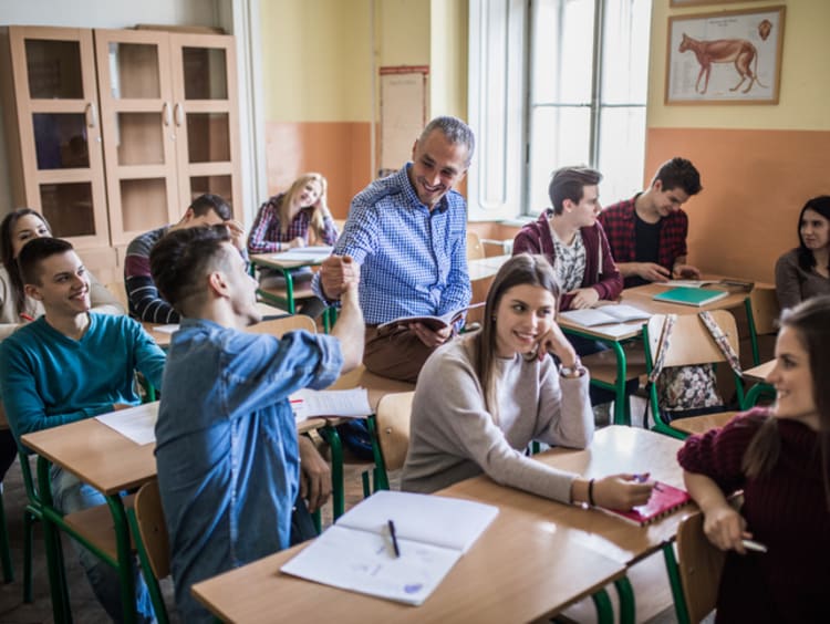 A charismatic teacher engaging with students