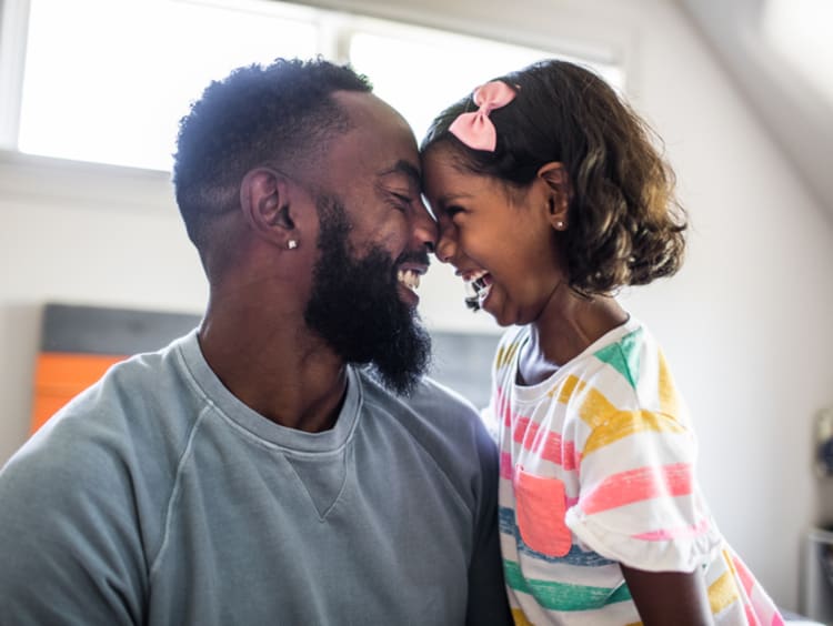 man and child smiling