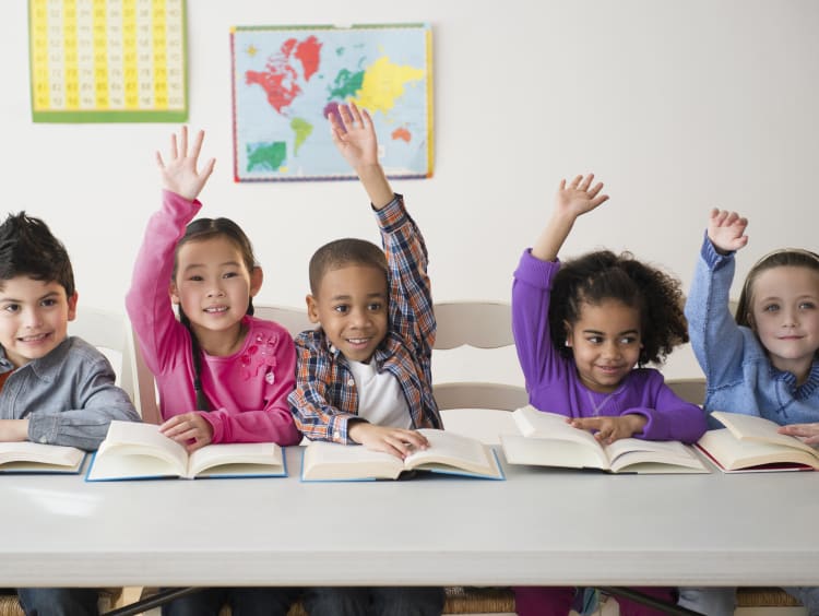 Students reading in the classroom