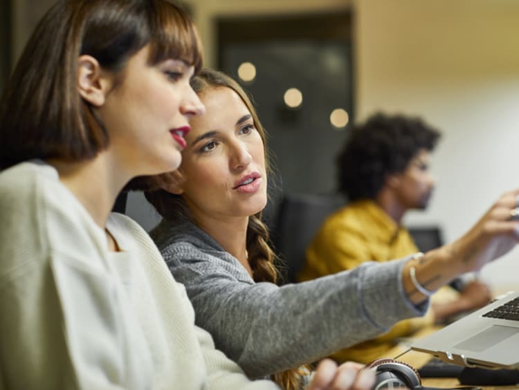 Students talking to each other in class