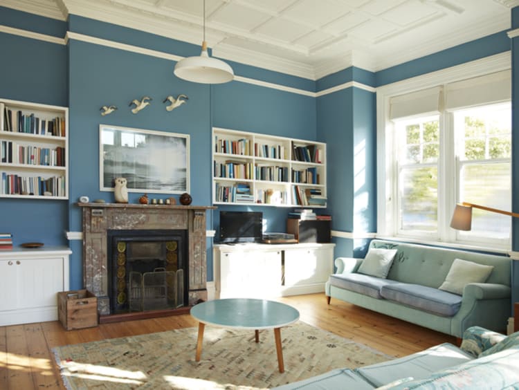 Interior of house with bookshelves and furniture