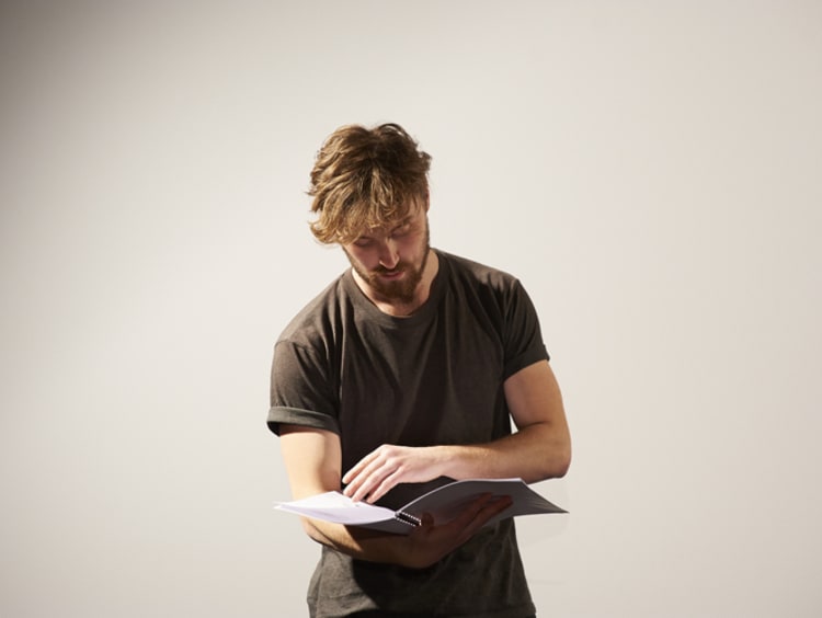 an actor reading a script