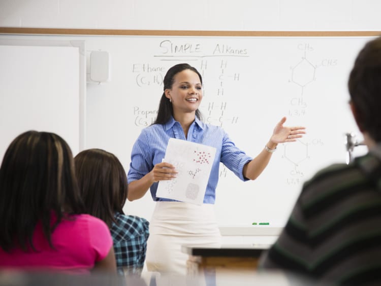 teacher calling on students to contribute