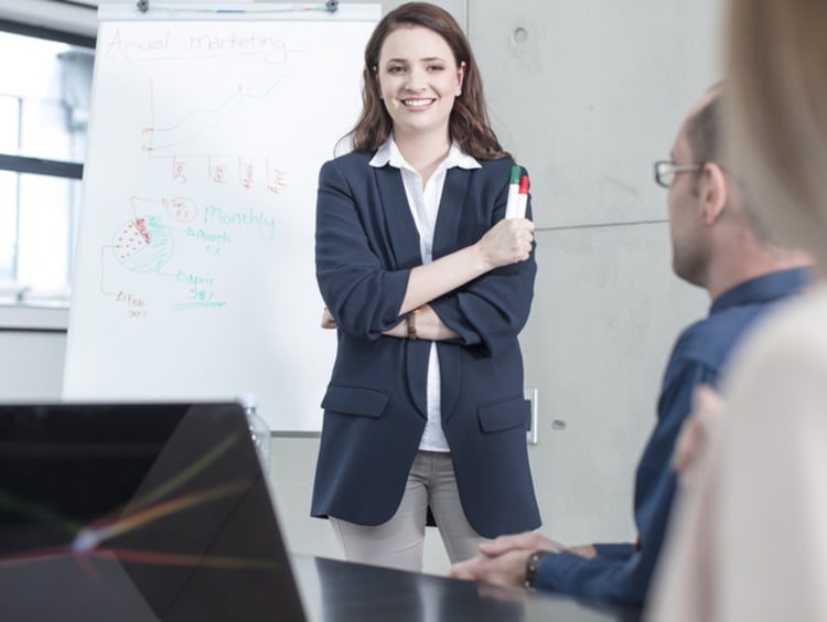 Businesswoman leading a presentation on a meeting