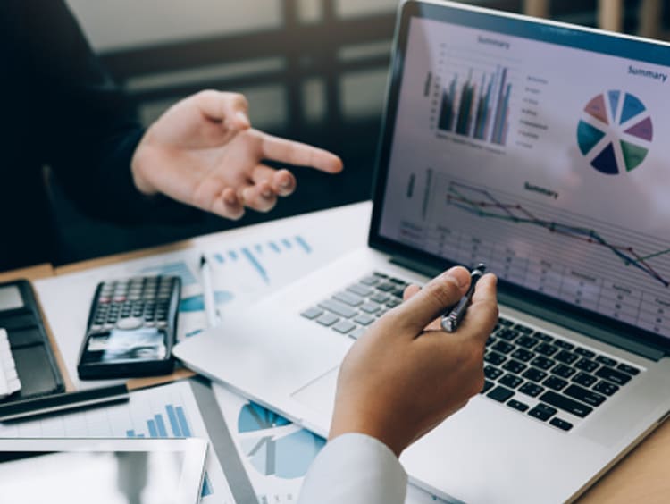 accounting degree graduates working on a report