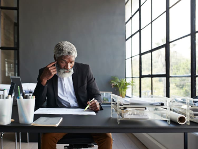 businessman studying some papers