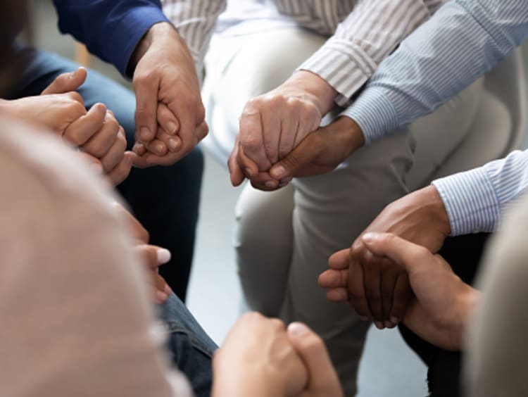 Christians Praying together against oppression