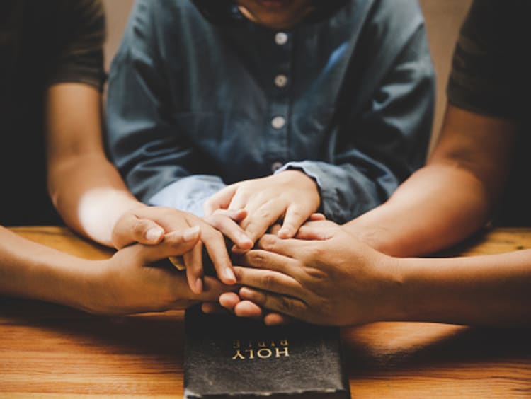 Peacemakers praying together for peace