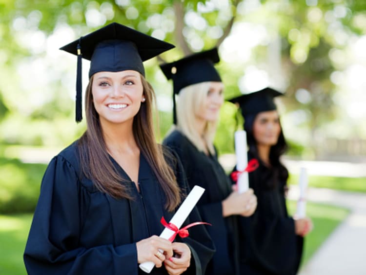 Girl holding her bachelor's degree in psychology