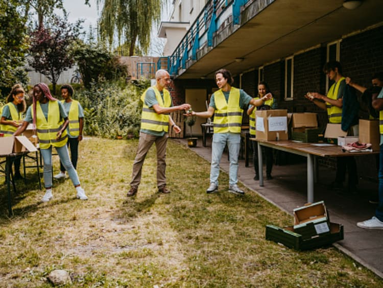 Nonprofit management degree students volunteering in community project