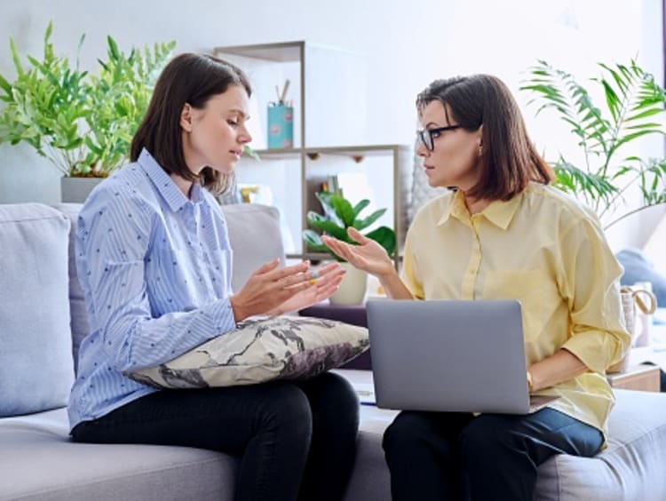 Organizational Psychologist talking to a client